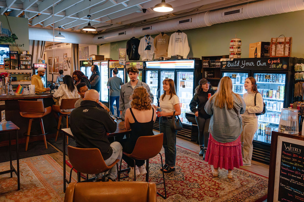 Sip City Charlotte taproom with guests